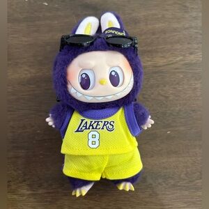 Labubu Lakers basketball player clothes. 
ONLY THE CLOTHES, not the doll